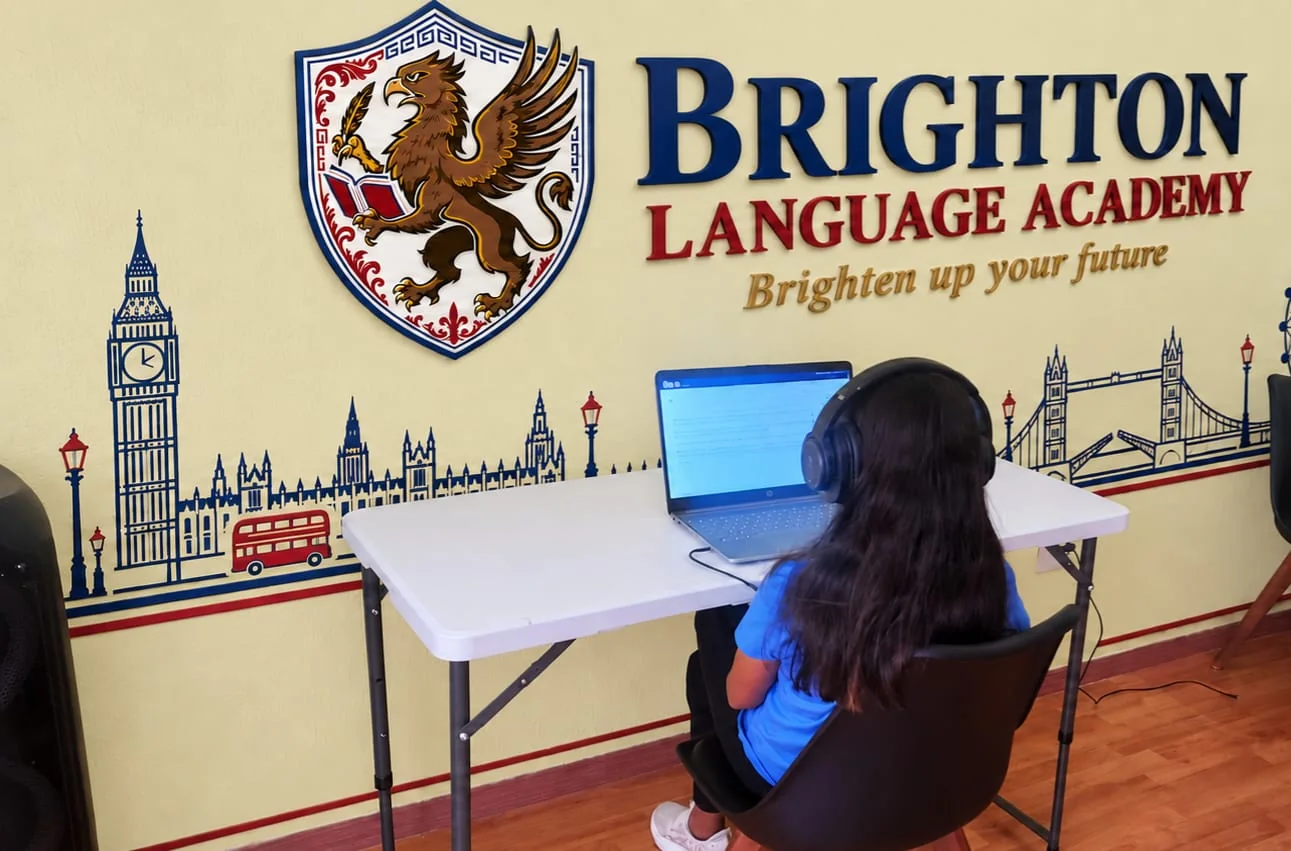 Student using technology during an English activity